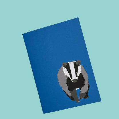 Blue Badger a6 notebook 36 plain pages. made with recycled paper and printed with plant based dyes at a UK carbon neutral printers 