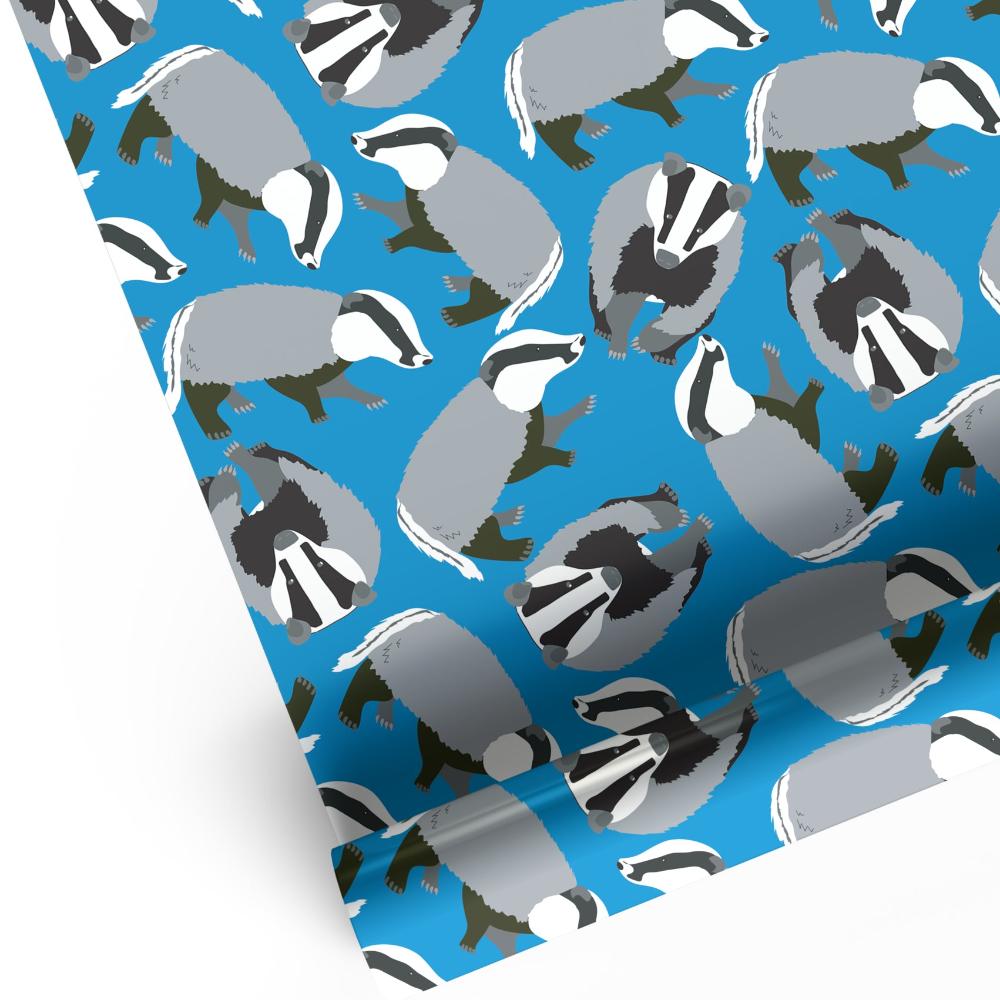 Bright blue badger animal print luxury gift wrap sheet shown rolled