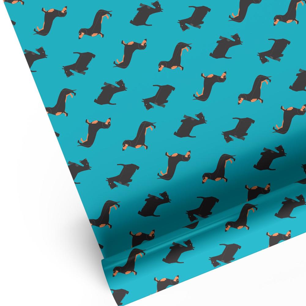 Rich petrol blue dog design animal print luxury gift wrap shown wrapping a gift