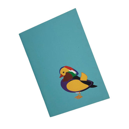 Mandarin Duck teal pocket sized notebook with 36 plain pages printed with plant based inks on recycled paper at a local carbon neutral printers