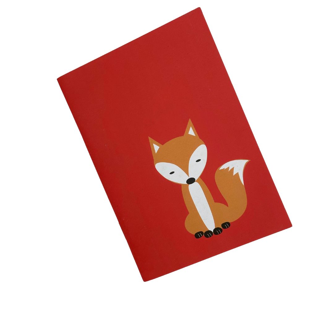 Fox red pocket sized notebook with 36 plain pages printed with plant based inks on recycled paper at a local carbon neutral printers