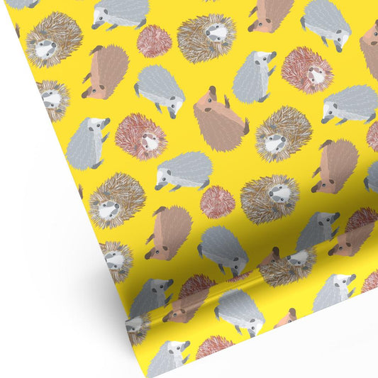 Bright yellow hedgehog animal print luxury gift wrap sheet shown rolled