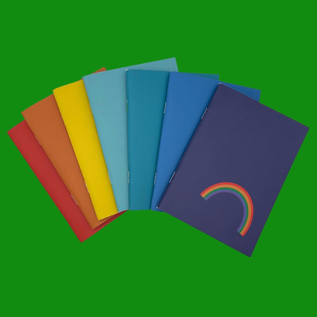 Colourful pocket sized notebooks each with 36 plain pages printed with plant based inks on recycled paper at a local carbon neutral printers