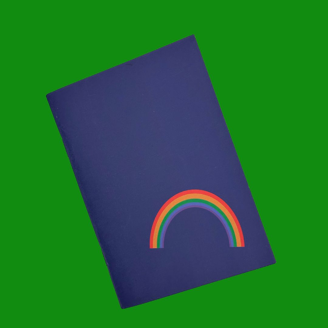 Rainbow pocket sized notebook with 36 plain pages printed with plant based inks on recycled paper at a local carbon neutral printers