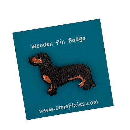 Black and Tan shorthair Dachshund  pin badge shown on display card