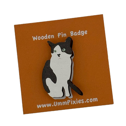 Black and White Tuxedo Cat  pin badge shown on display card