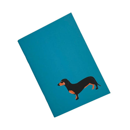 Dachshund petrol blue pocket sized notebook with 36 plain pages printed with plant based inks on recycled paper at a local carbon neutral printers